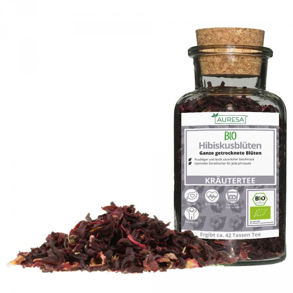 Loose organic hibiscus blossom tea in a glass