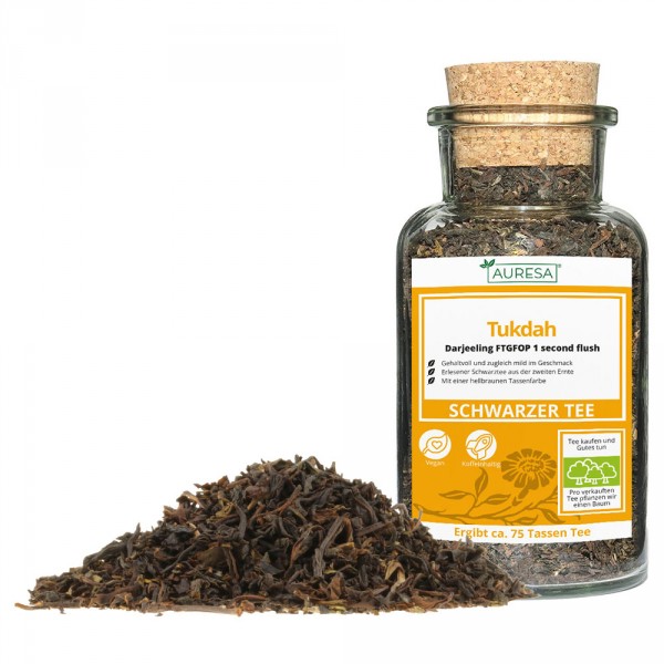 Loose black tea Darjeeling Tukdah in a glass